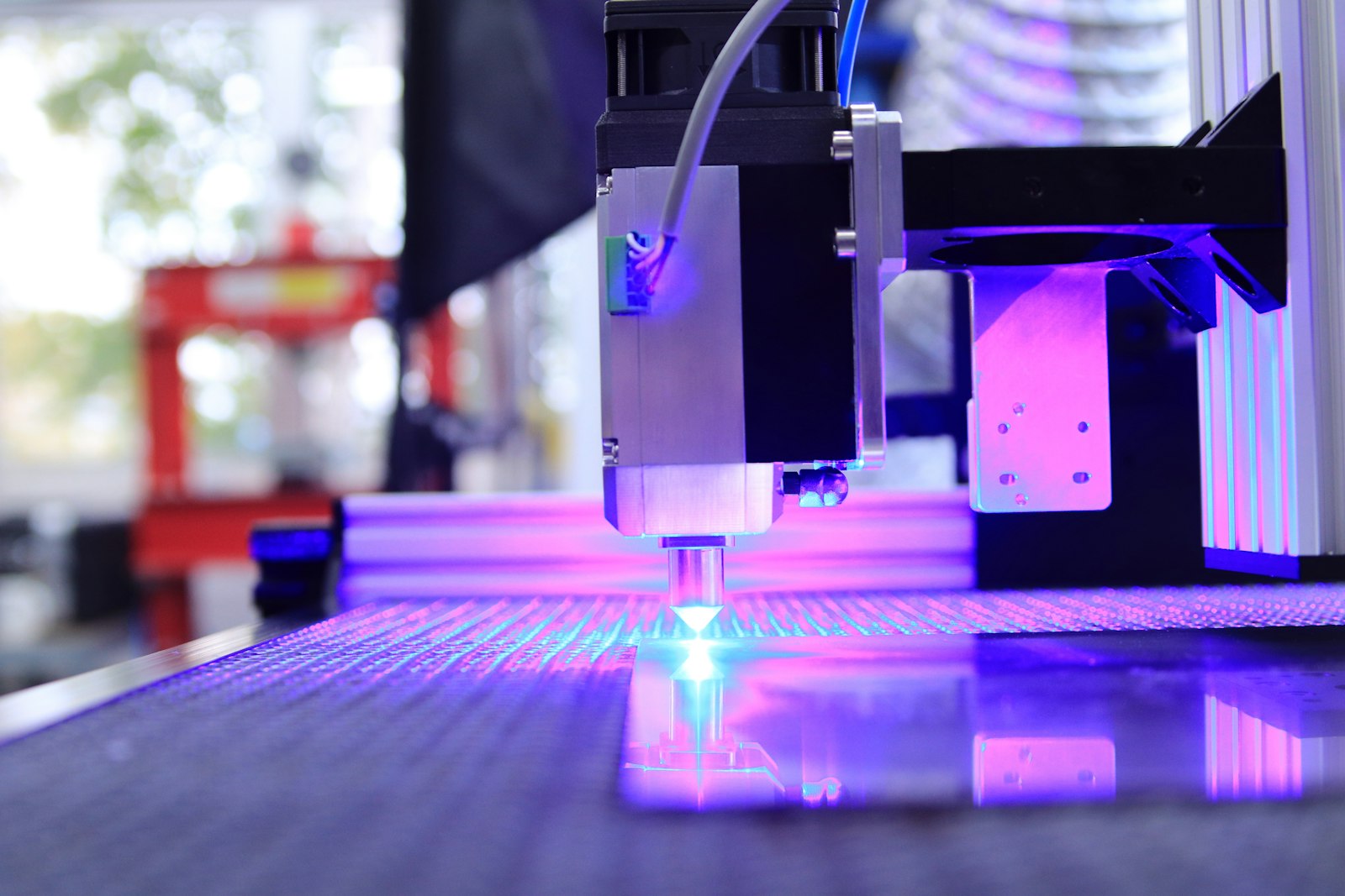 Ultrafast laser ablation in progress on a metal workpiece