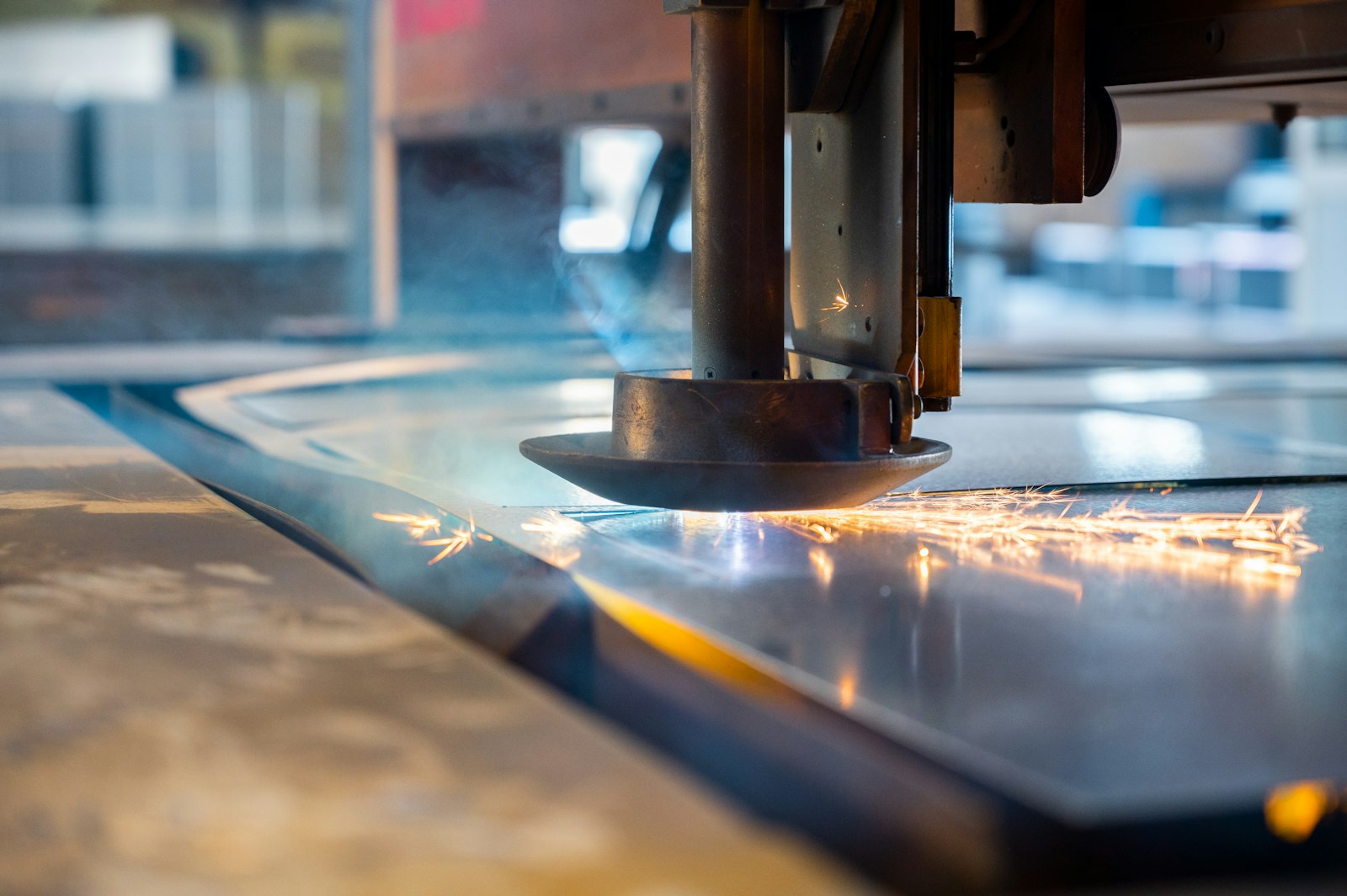 UV laser processing a fine-pitch workpiece
